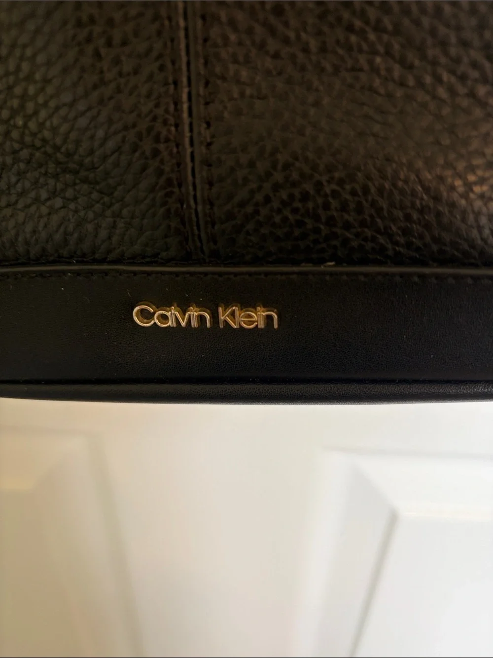 Calvin Klein Black Pebbled Leather Crossbody with Gold Accents